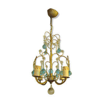 Antique chandelier with blue grapevines