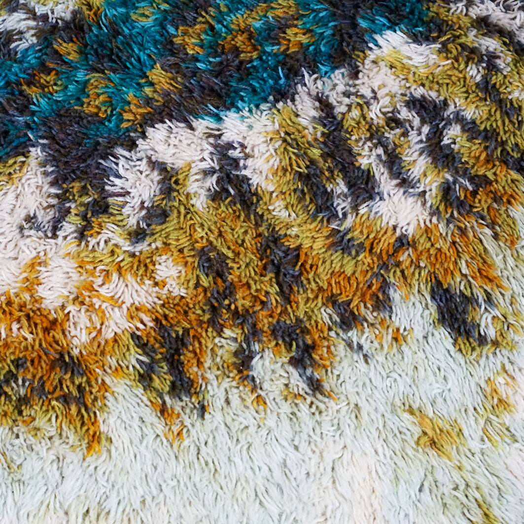 Rya rug made of wool in beige, brown and turquoise
