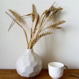 white ceramic faceted design vase