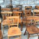Set of 15 mismatched curved wood bistro chairs
