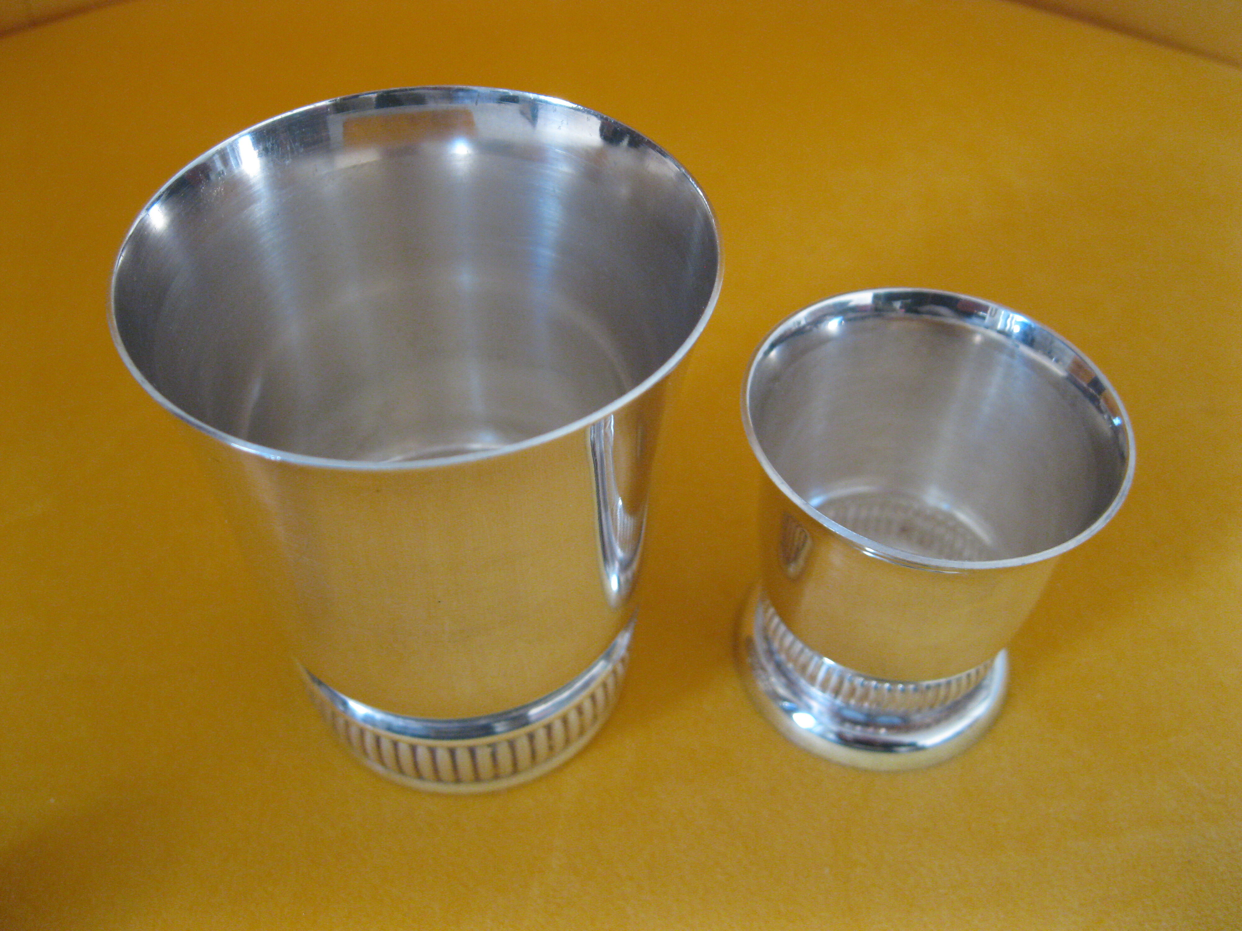 Duo of small silver metal timpani