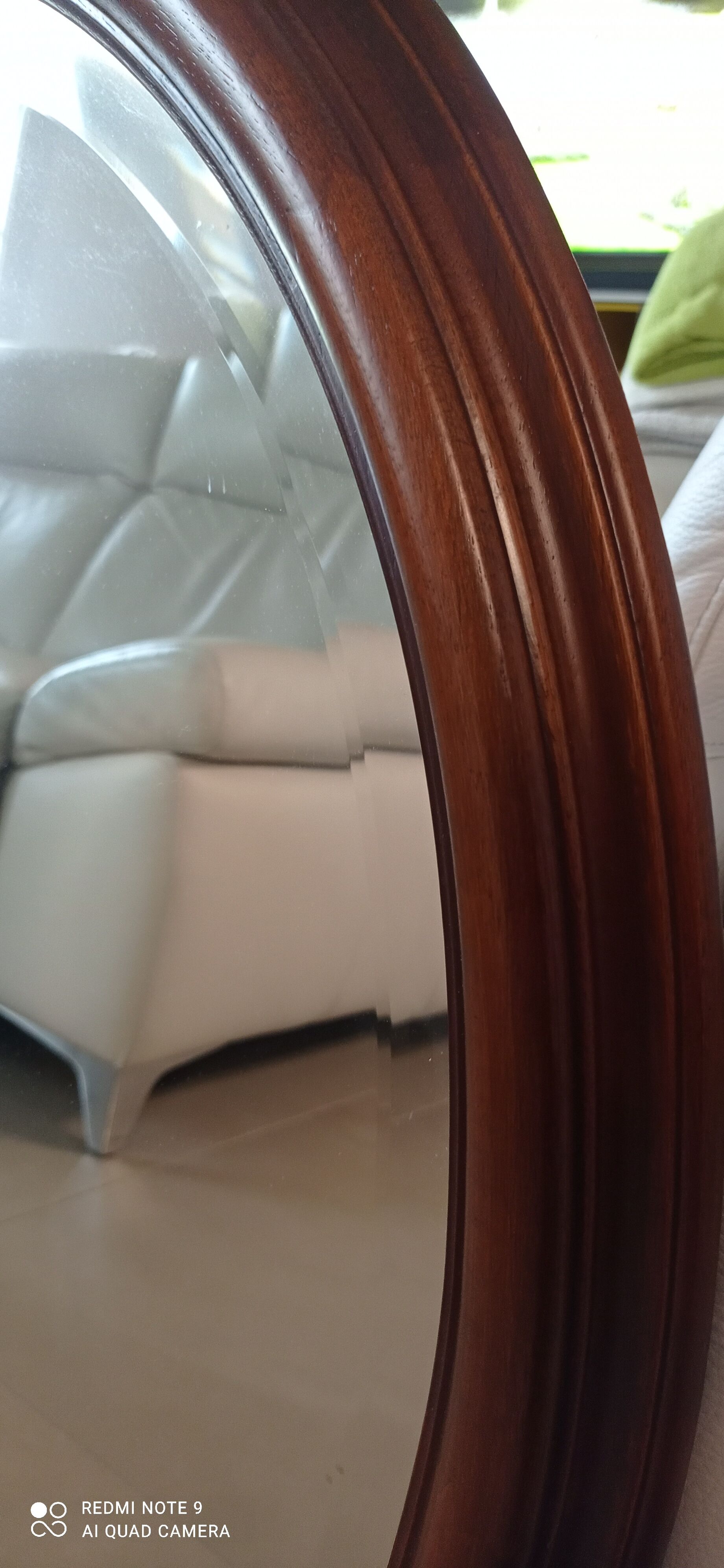 Old beveled oval mirror in excellent condition