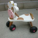 Wooden trotter carrier cow