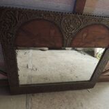 framed mirror with bird motif