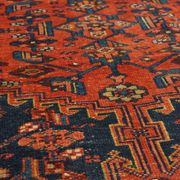 Antique hand-knotted oriental rug with predominantly red, purple, and blue colors 182x136cm