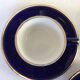 Lot de 3 tasses, soucoupes et d'un pot à lait bleues marine en porcelaine Delaunay