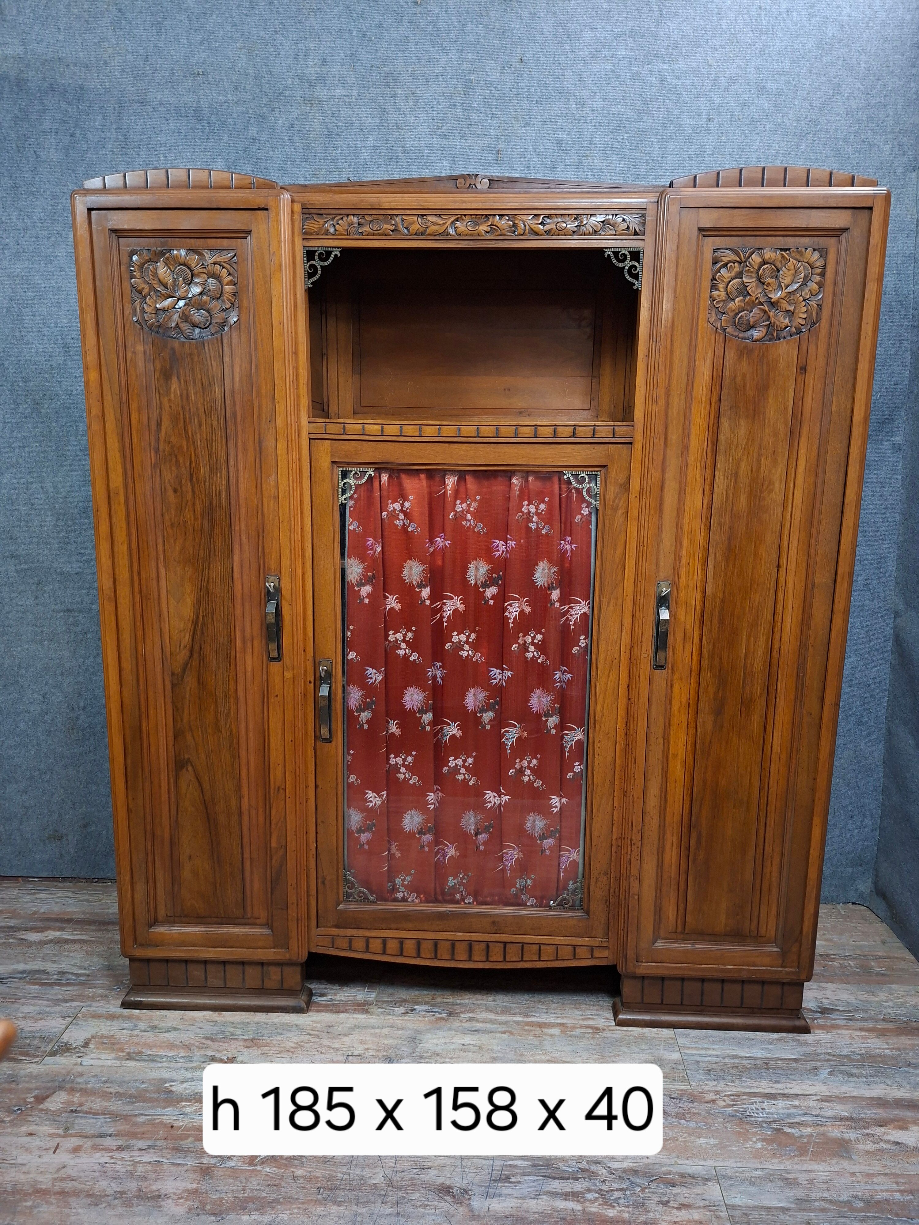 Art Deco library in carved walnut, circa 1930
