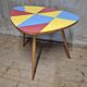 Czechoslovak table in Brussels style, made of oak and colourful umakart, 1950s.
