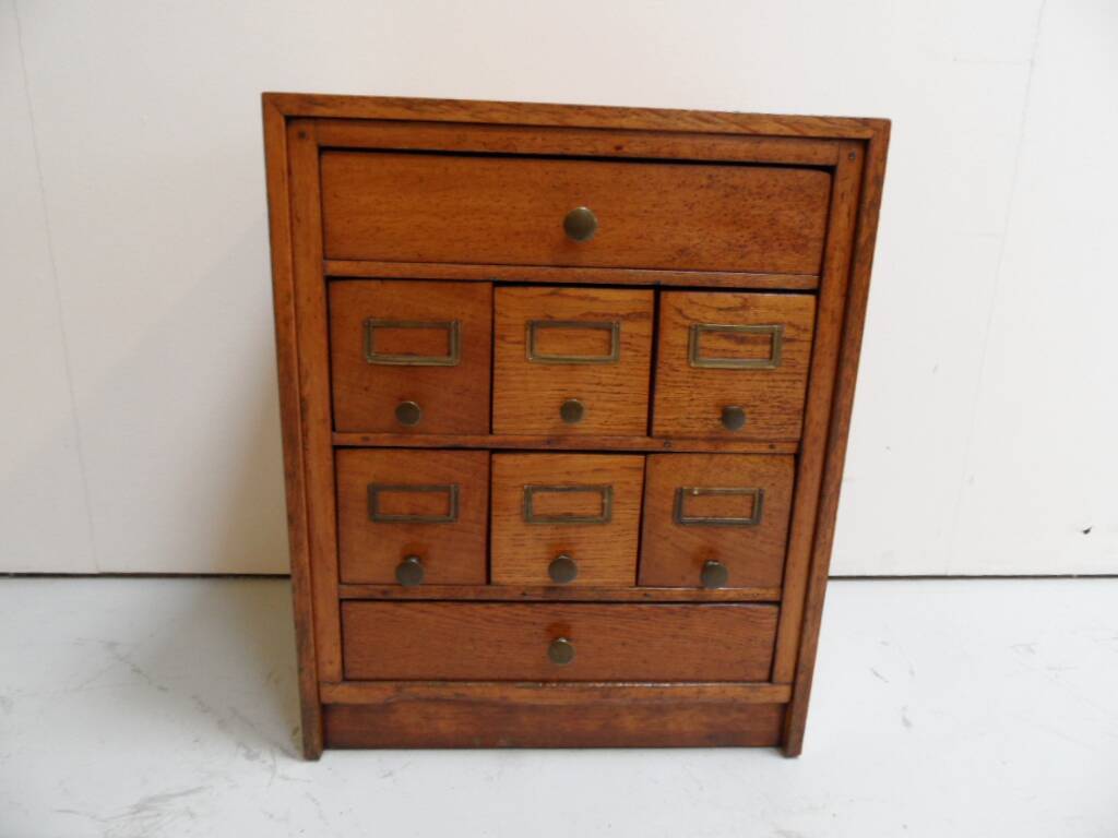 Antique oak watchmakers cabinet with drawers