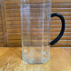 Old pichet arcoroc model octime transparent glass + black handle wine