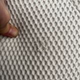 Roche Bobois canapé bubble April 2024. White. A frayed mesh.