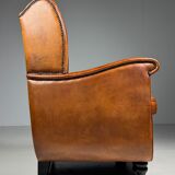 Set of 2 sheepskin club armchairs