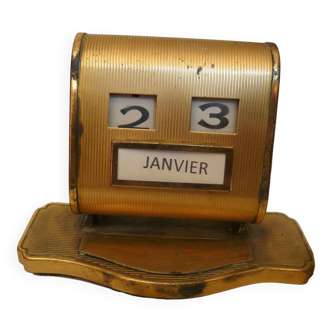 Perpetual calendar in gilded metal