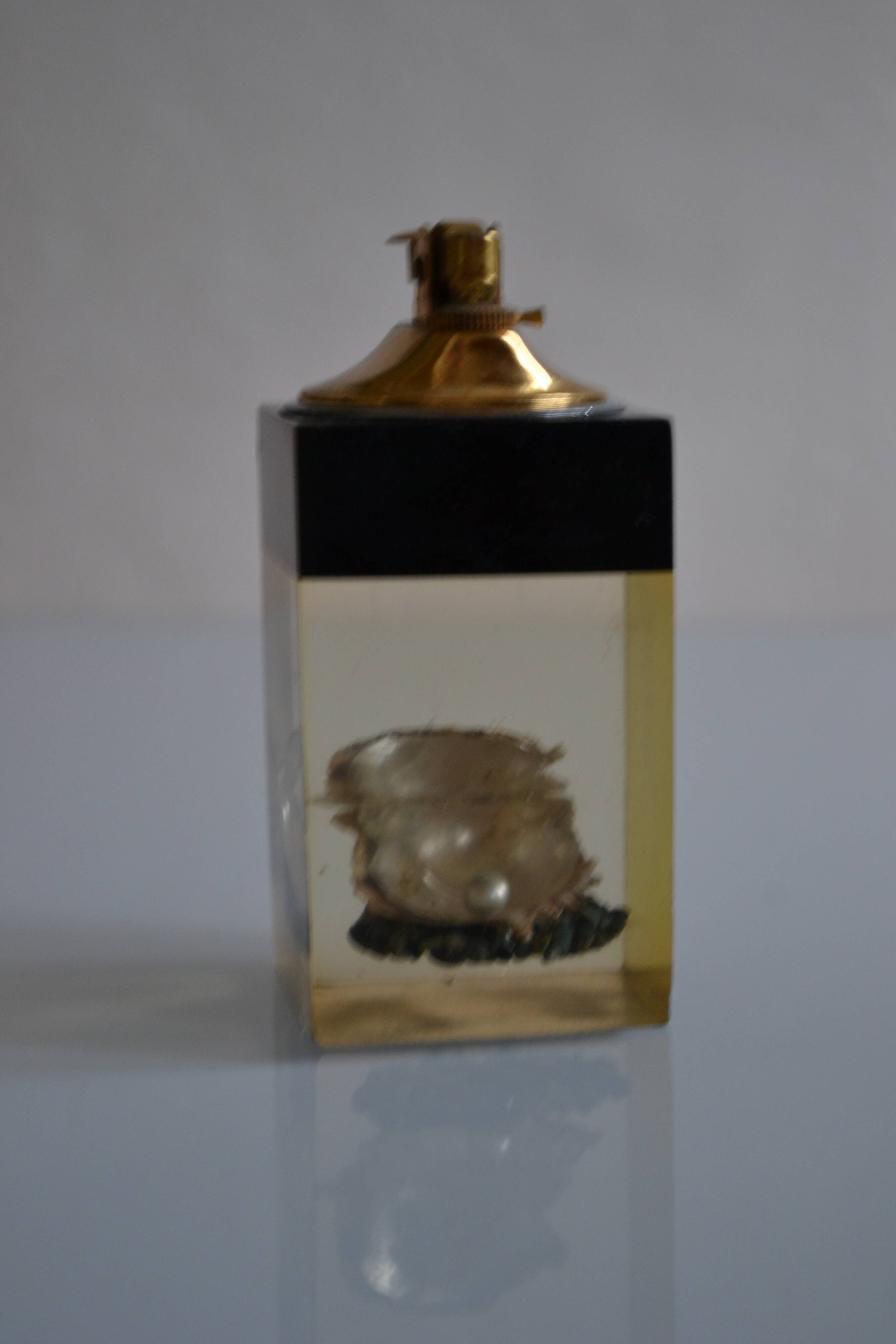 1970 Table lighter with pearl oyster in resin inclusion