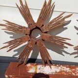 2 wooden sun mirrors and golden plaster