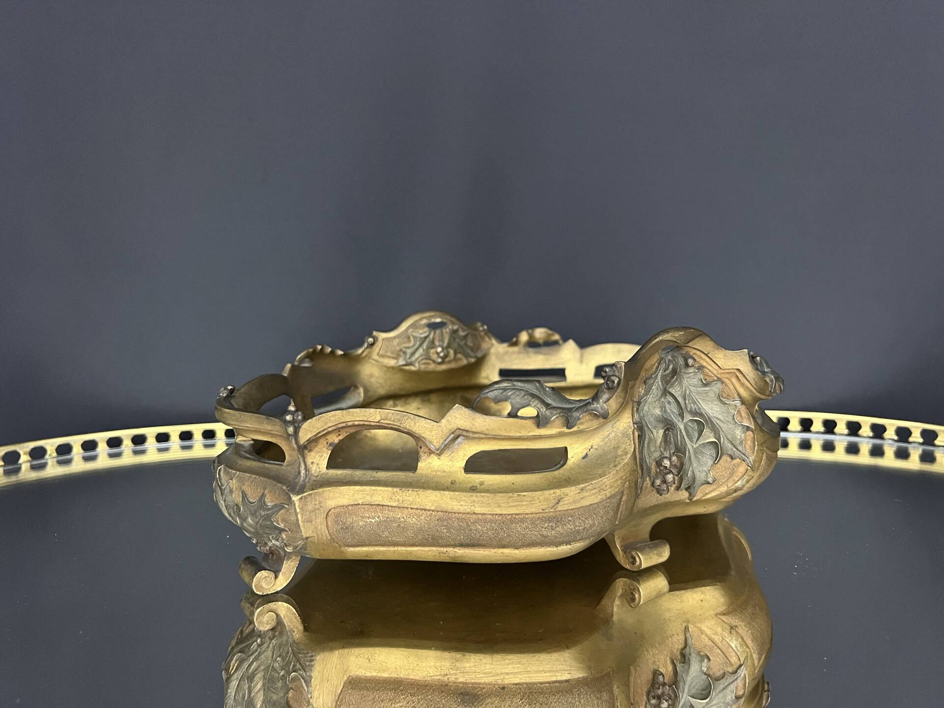 Art Nouveau jardinière in gilded bronze with holly decoration, signed E. Gros.