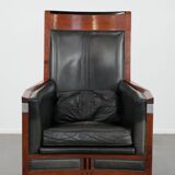 Black Art Deco cowhide leather and wooden design armchair with a high back