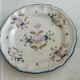 Assiette decorative en faience signé