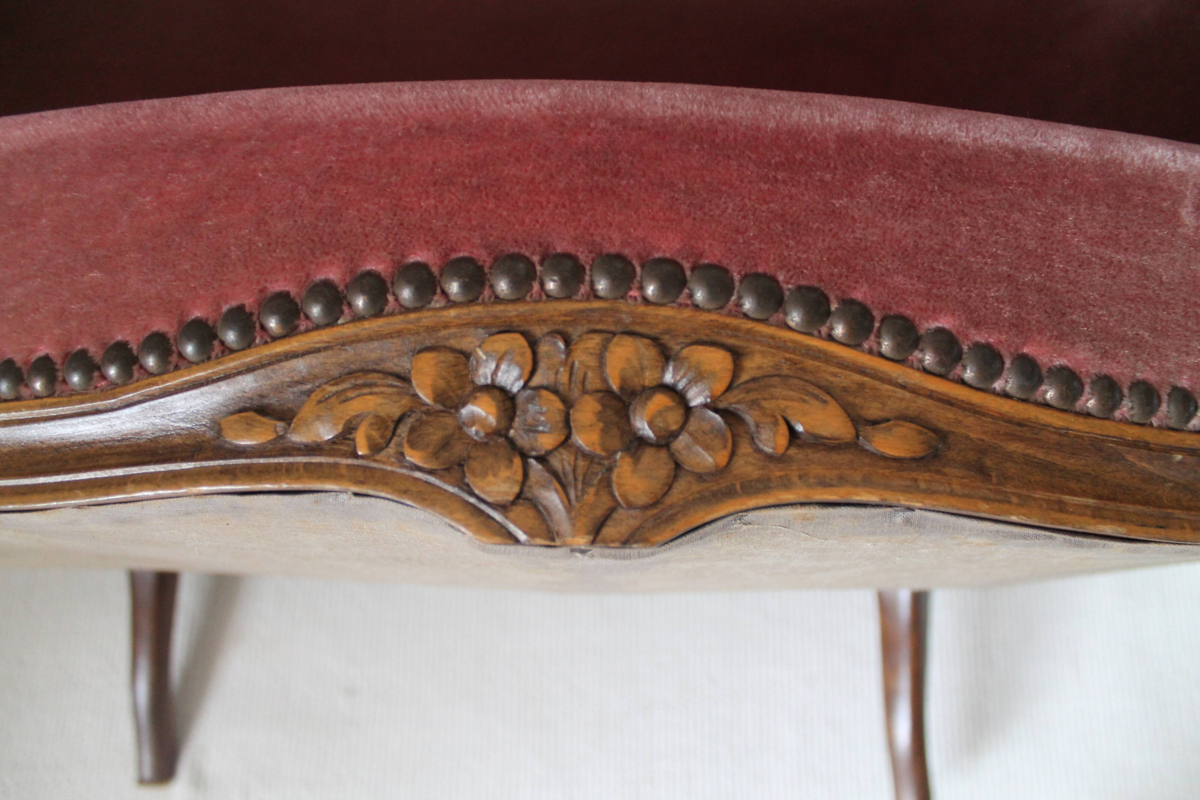 Faded pink velvet sofa