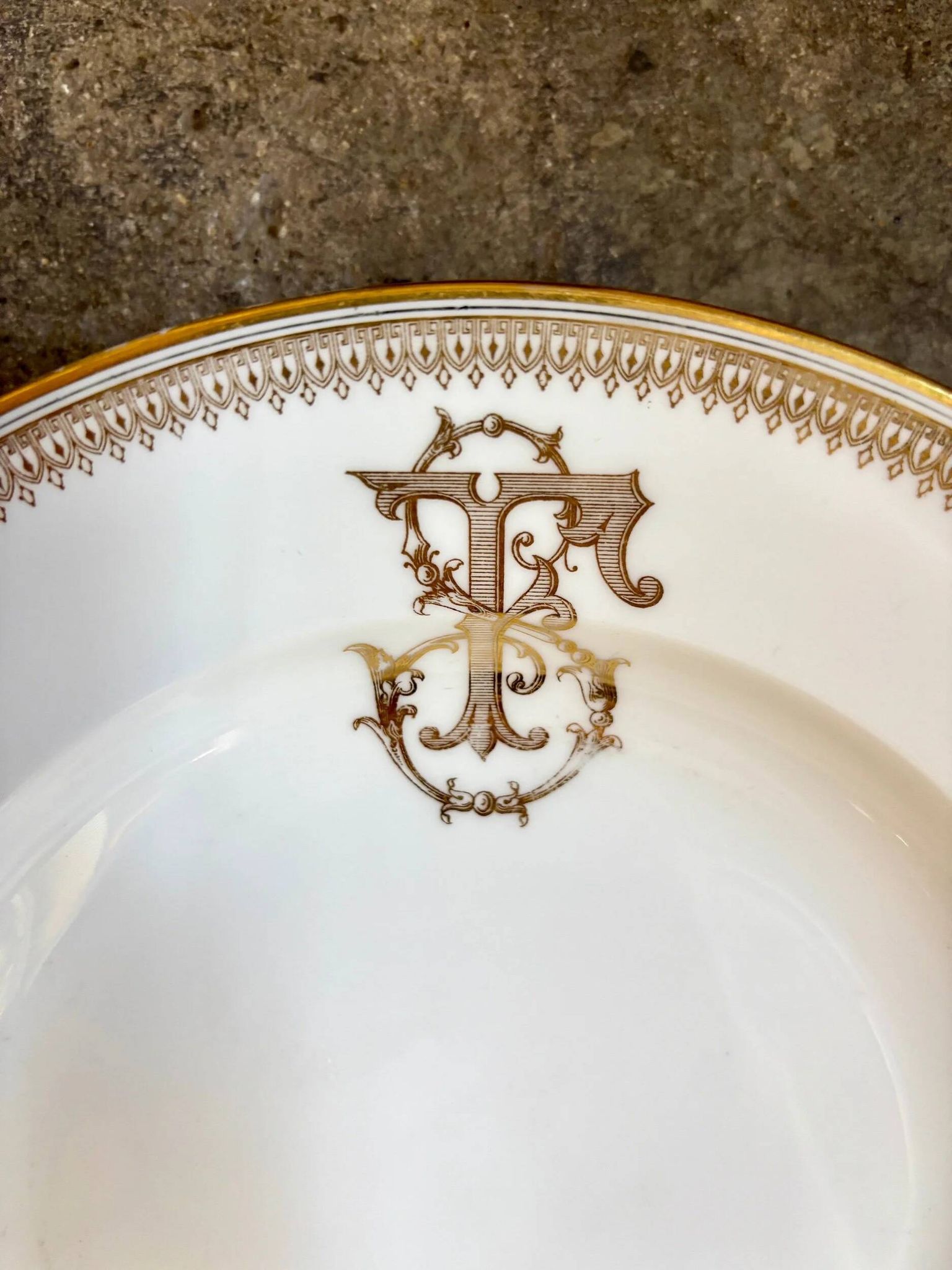 Gold monogrammed porcelain deep plate "F"