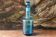 Large blown crystal bottle, twisted, turquoise blue, early 20th century.
