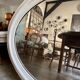 Oval mirror in pearl-coloured stucco 85 x 114 cm