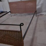 Black metal and rattan bed frame