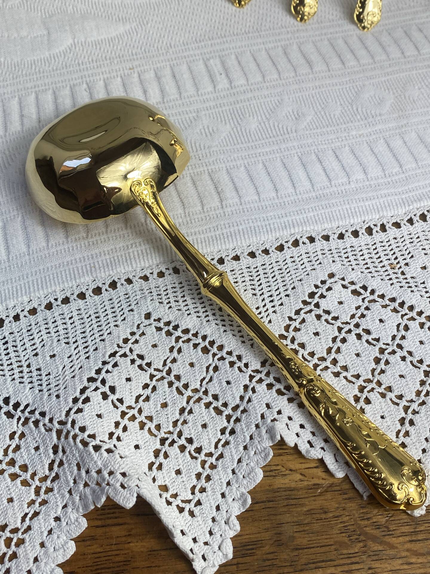 Dessert spoons and serving ladle