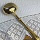 Dessert spoons and serving ladle