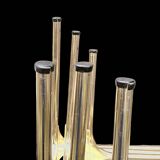 Trio of nesting tables in gold, smoked safety glass, 1970s