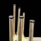 Trio of nesting tables in gold, smoked safety glass, 1970s