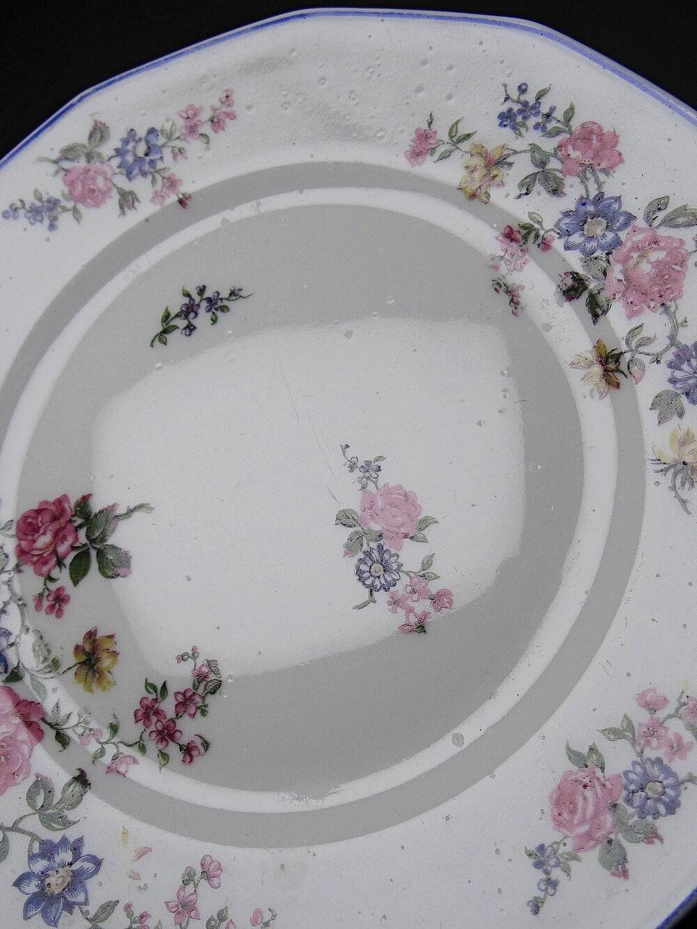 7 assiettes à dessert Bernardaud en porcelaine de Limoges décor floral, années 20-50