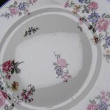 7 assiettes à dessert Bernardaud en porcelaine de Limoges décor floral, années 20-50