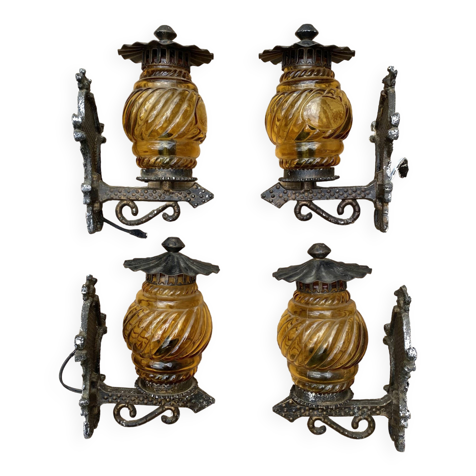 Medieval style metal and amber glass wall lamp