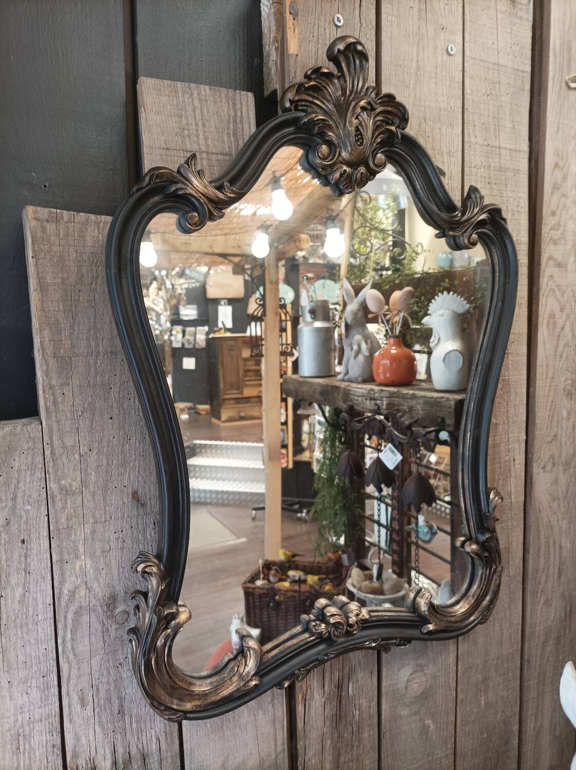 Black and gold baroque mirror