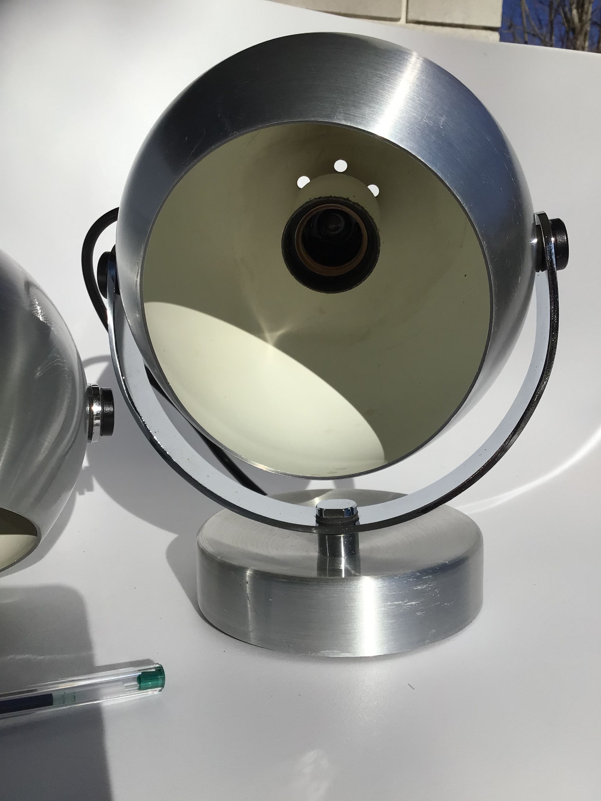 Pair of vintage brushed aluminum eyeball wall lamps