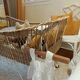 Rattan and wrought iron cradle