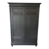 Large black wooden wardrobe