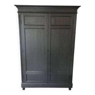 Large black wooden wardrobe