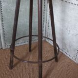 high factory stool made of wood and metal