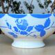 Large antique earthenware bowl from Gien, Mona decoration.