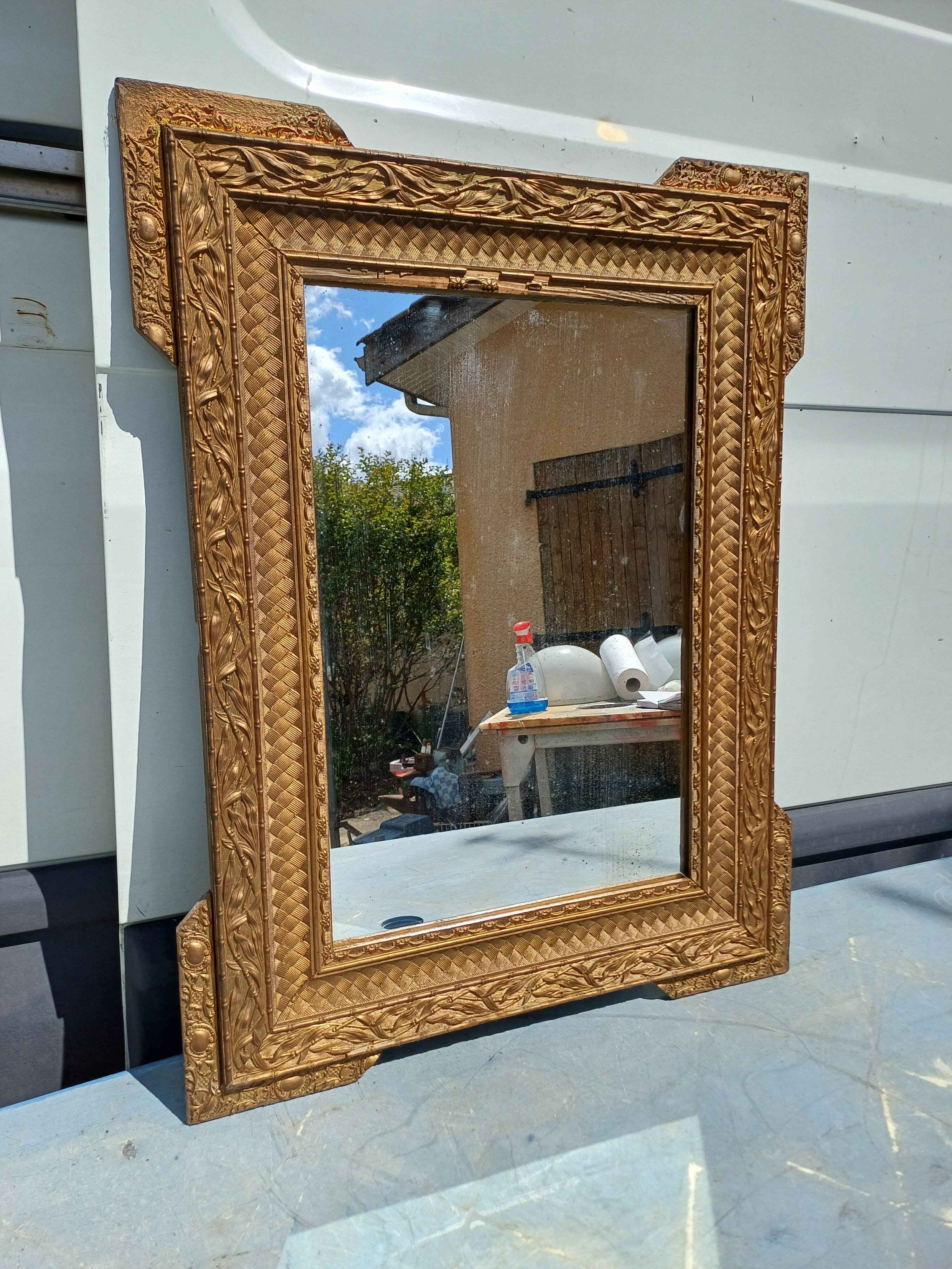 Wood and gilded Stuk mirror 19th