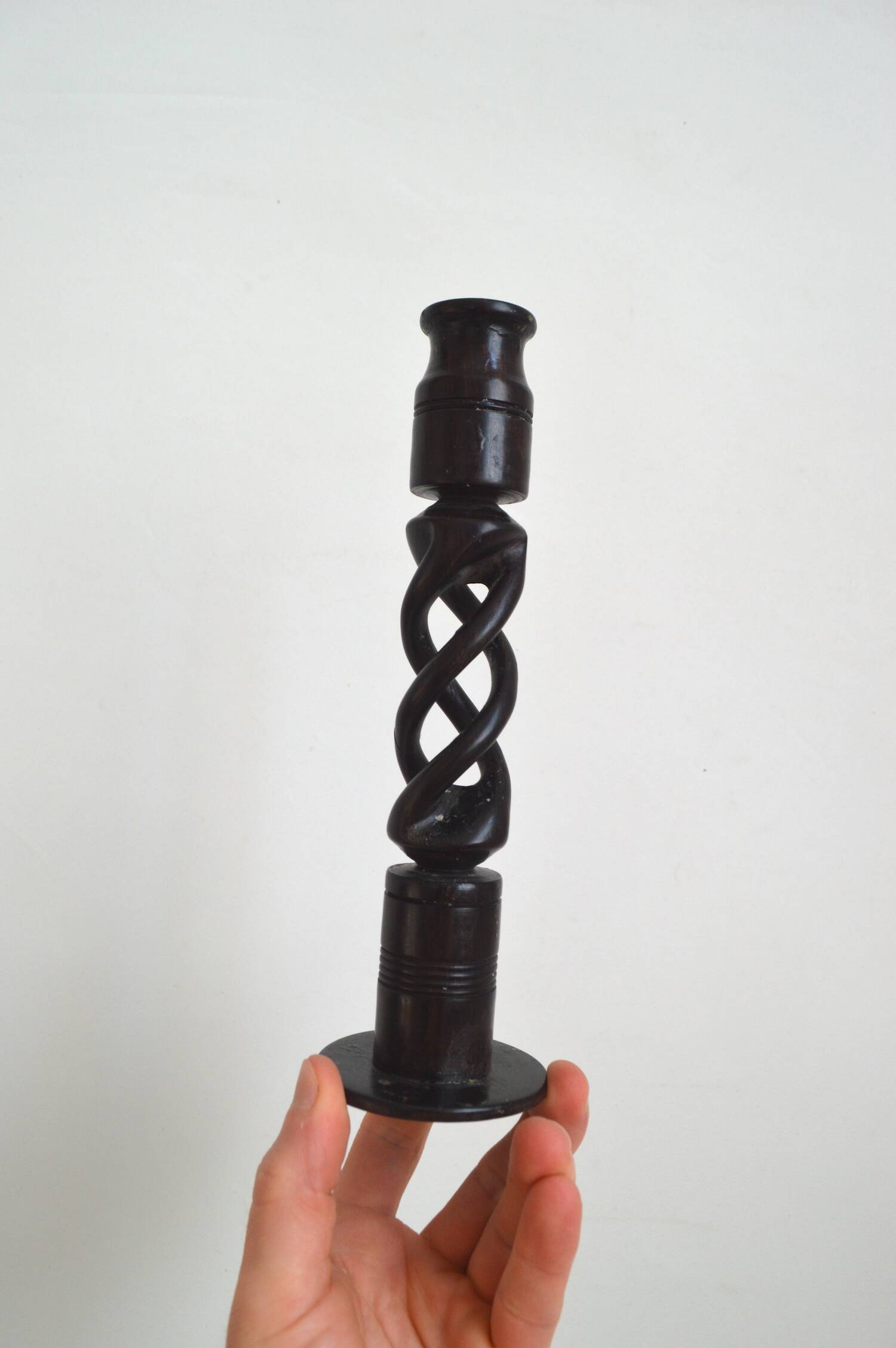 Twisted ebony candle holder