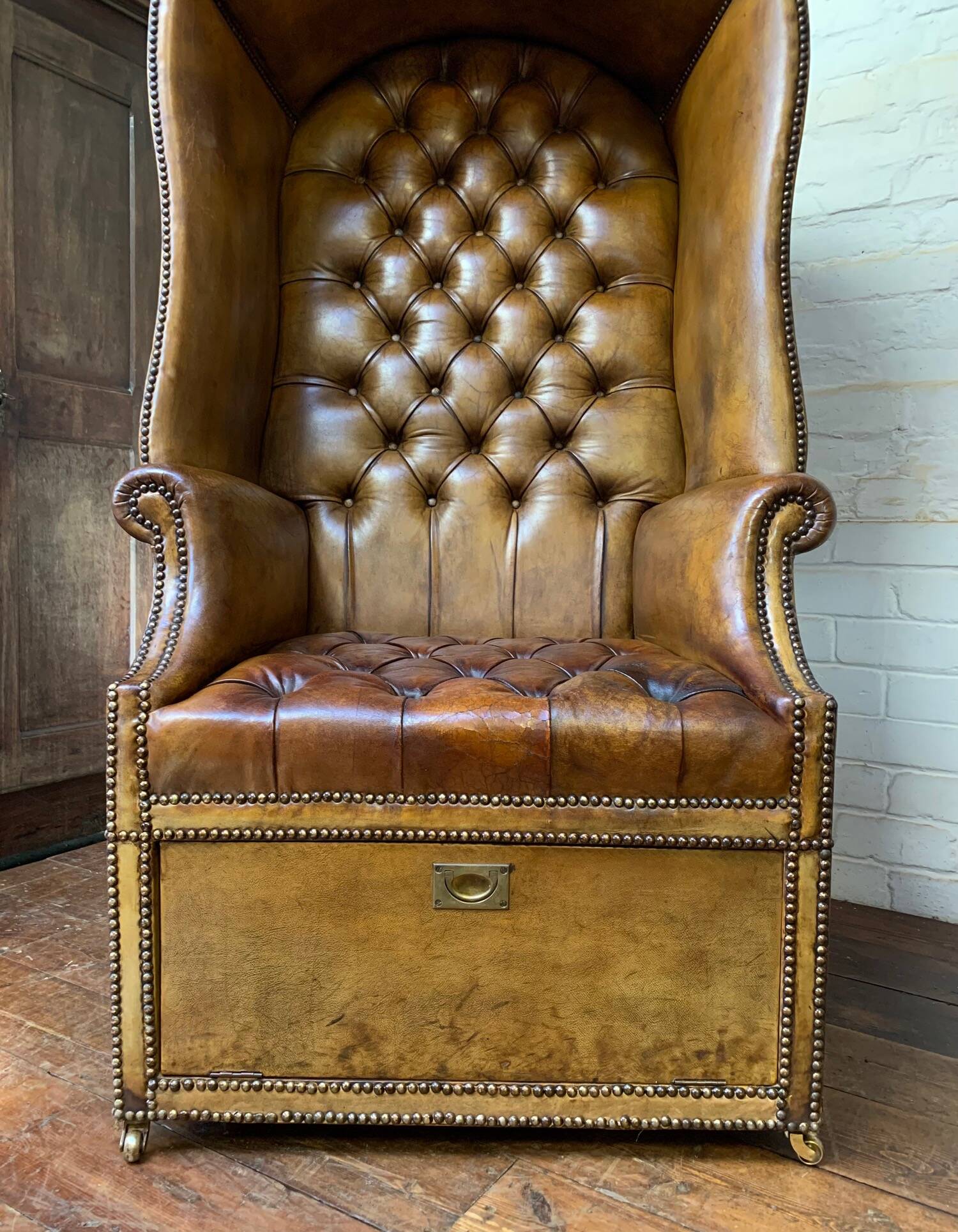 A Rare & Exceptional Deep-Buttoned Chesterfield Porter’s Chair Circa 1920’s