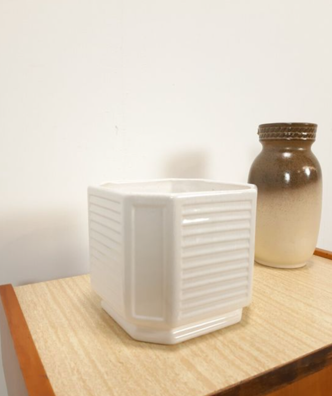 White vintage pot cover with stripes