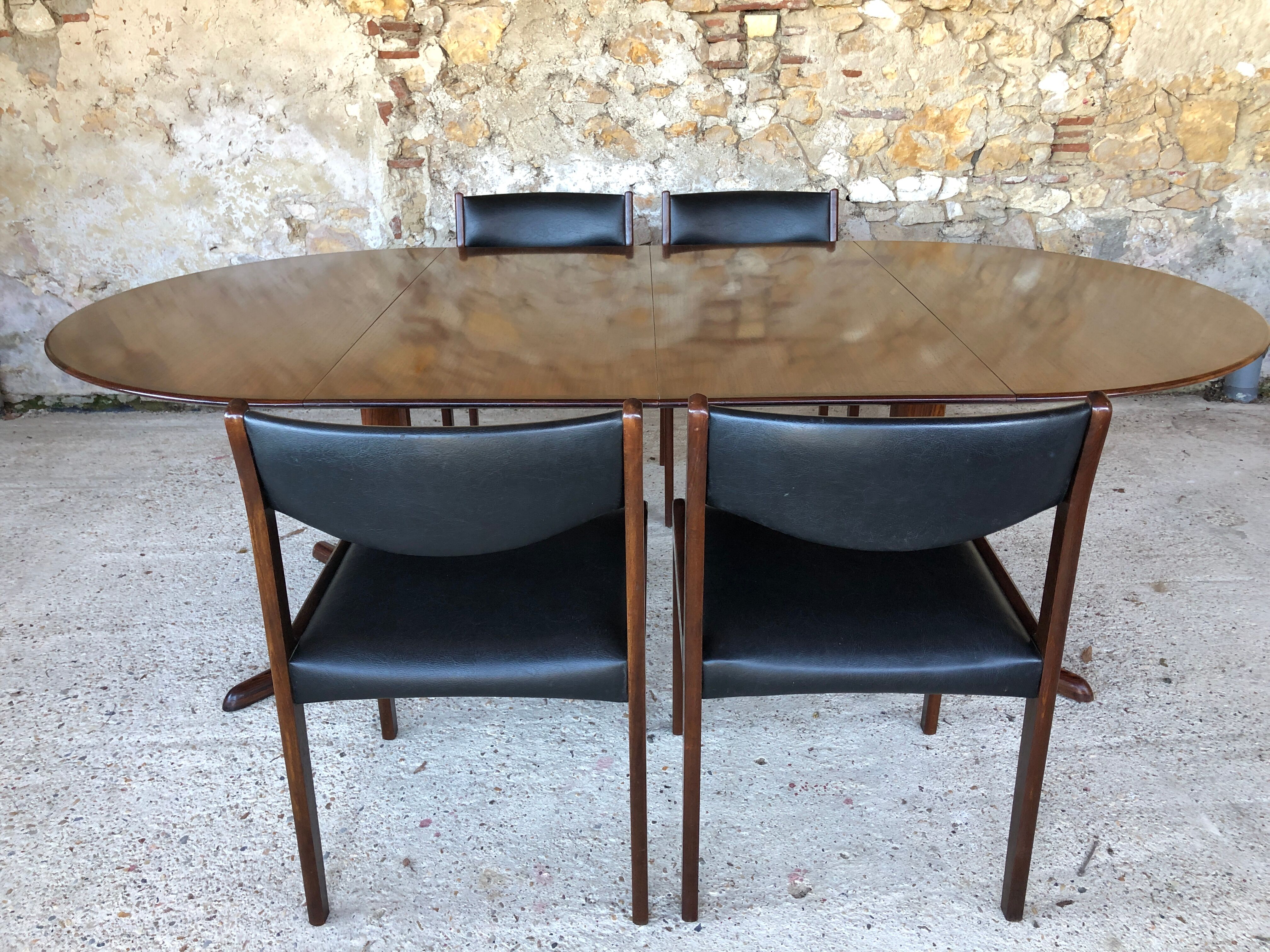 Expandable Scandinavian rosewood dining table by CJ Rosengaarden, circa 60's
