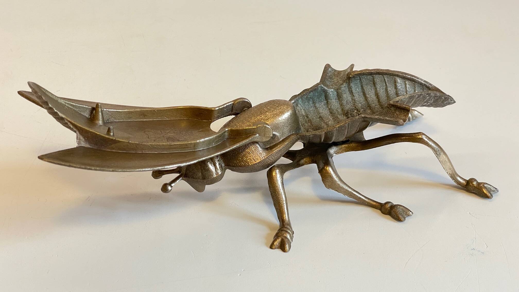 Vintage fly ashtray in patinated metal