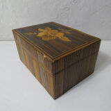 Old trundle boxes in straw marquetry
