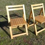 Pair of vintage folding chairs in light wood