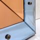 Bevelled wall mirror with blue and copper mirror panels - Italy 1930s